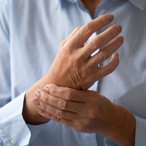 person experiencing chronic wrist pain